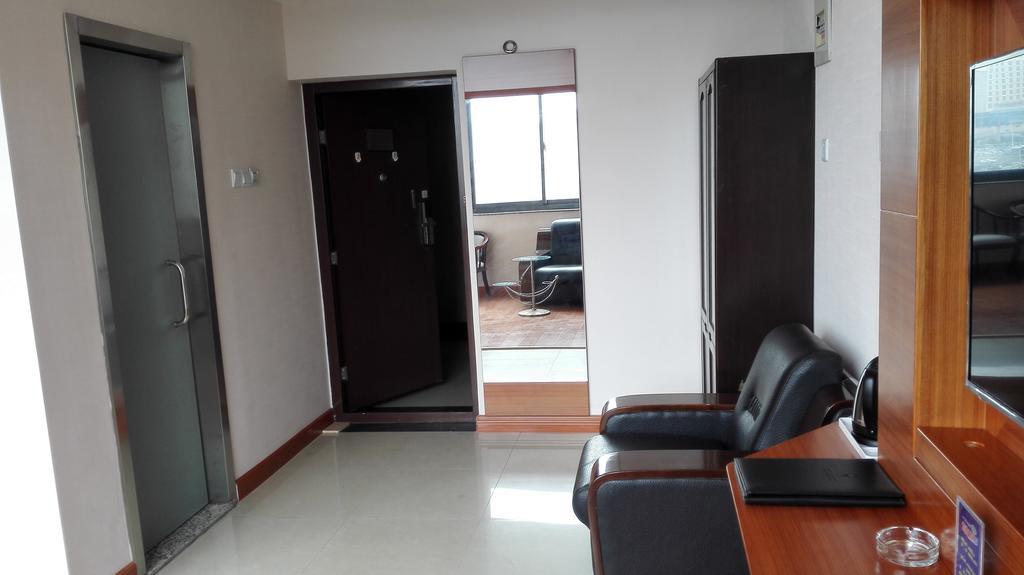 Weihai Times Business Hotel Quarto foto