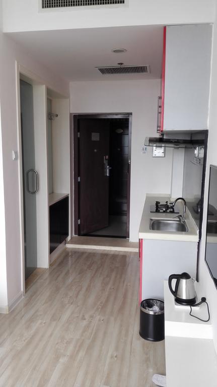 Weihai Times Business Hotel Quarto foto