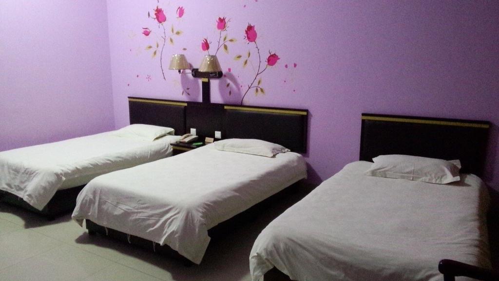 Weihai Times Business Hotel Quarto foto